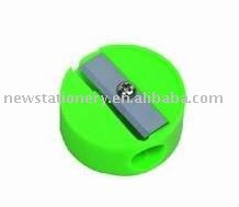 green round plastic pencil sharpener